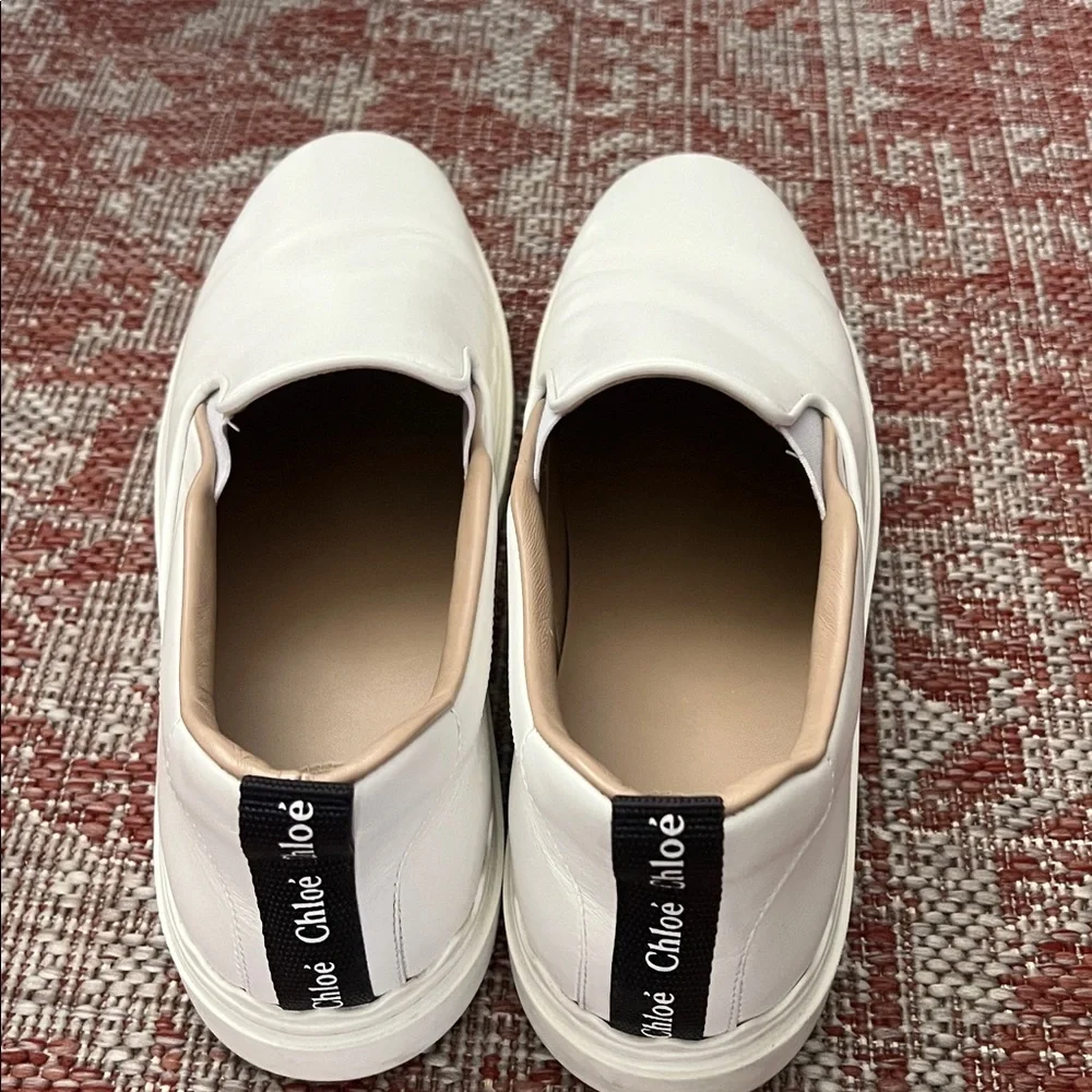 Chloe White Slip-On Sneakers - Picture 2 of 9
